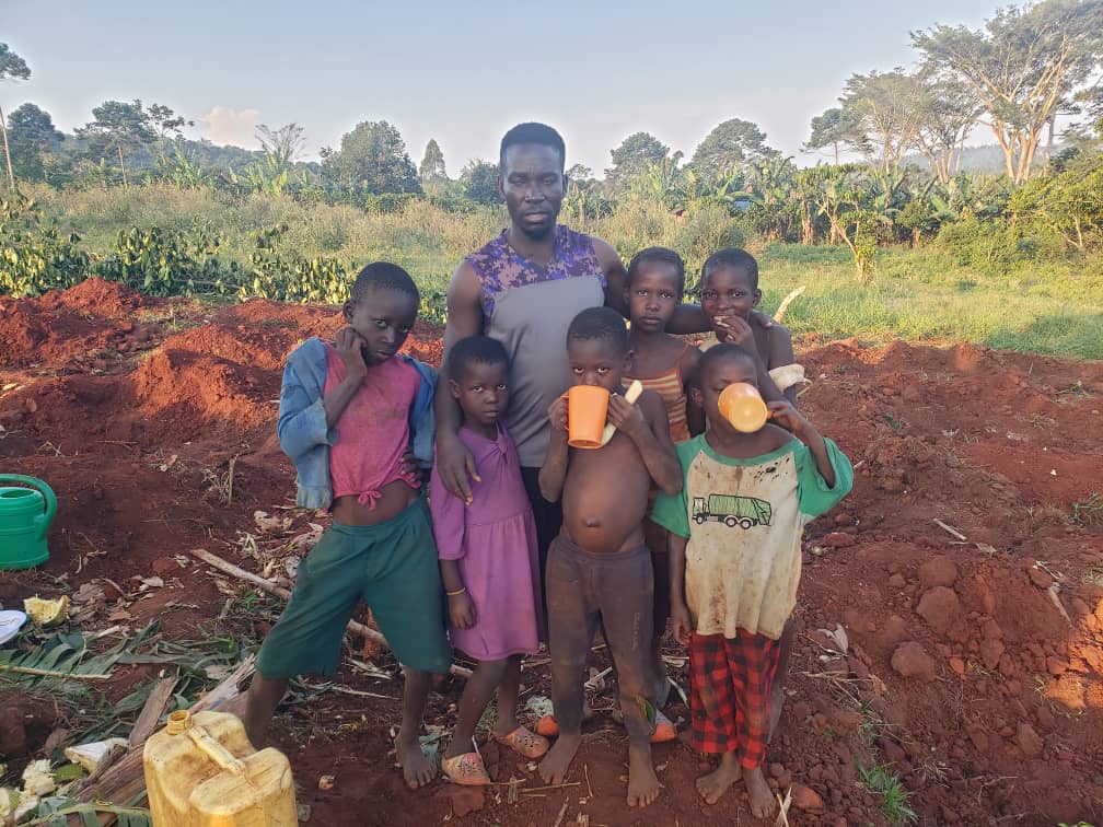 Feeding children in Uganda